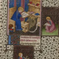 John writing in a codex with a scroll on the floor